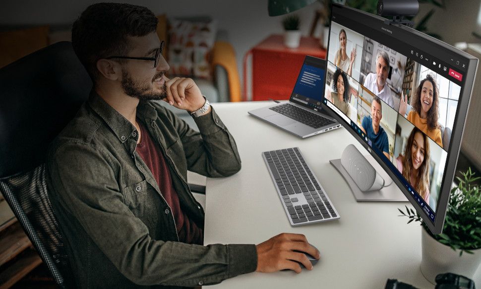 Man using dell laptop at desk