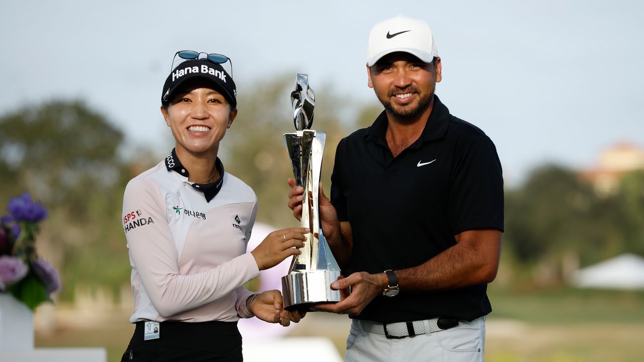 Lydia Ko and Jason Day with the Grant Thornton Invitational trophy