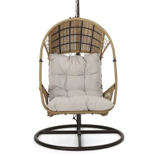 An egg swing chair with stand