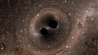 A simulated image of two black holes colliding.