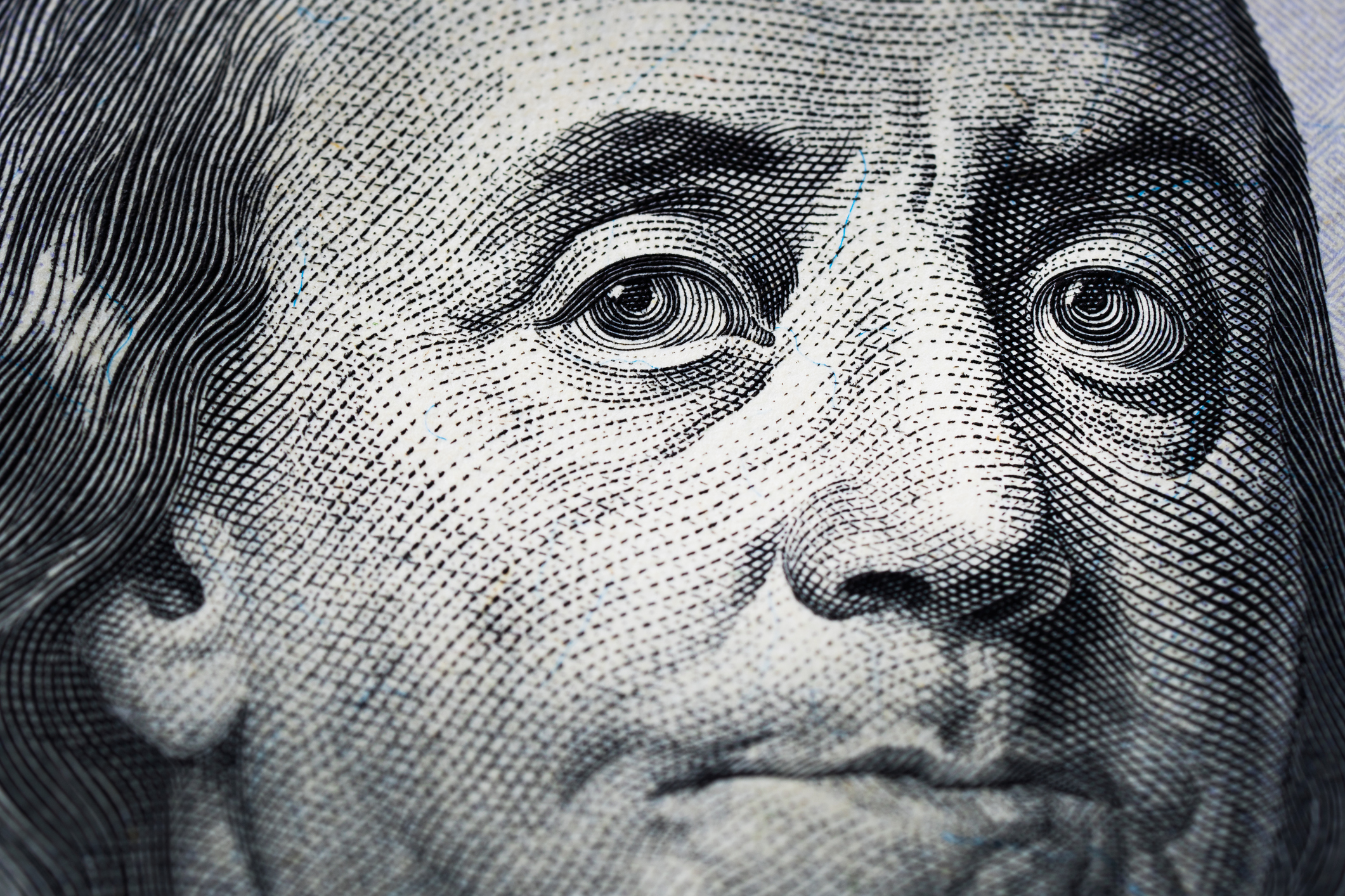 Close-up portrait of Benjamin Franklin on a one-hundred-dollar bill