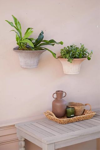 Outdoor planters: Image of Anthropologie hanging planter 