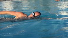 FORM Smart Swim 2 swimming goggles being worn by our reviewer