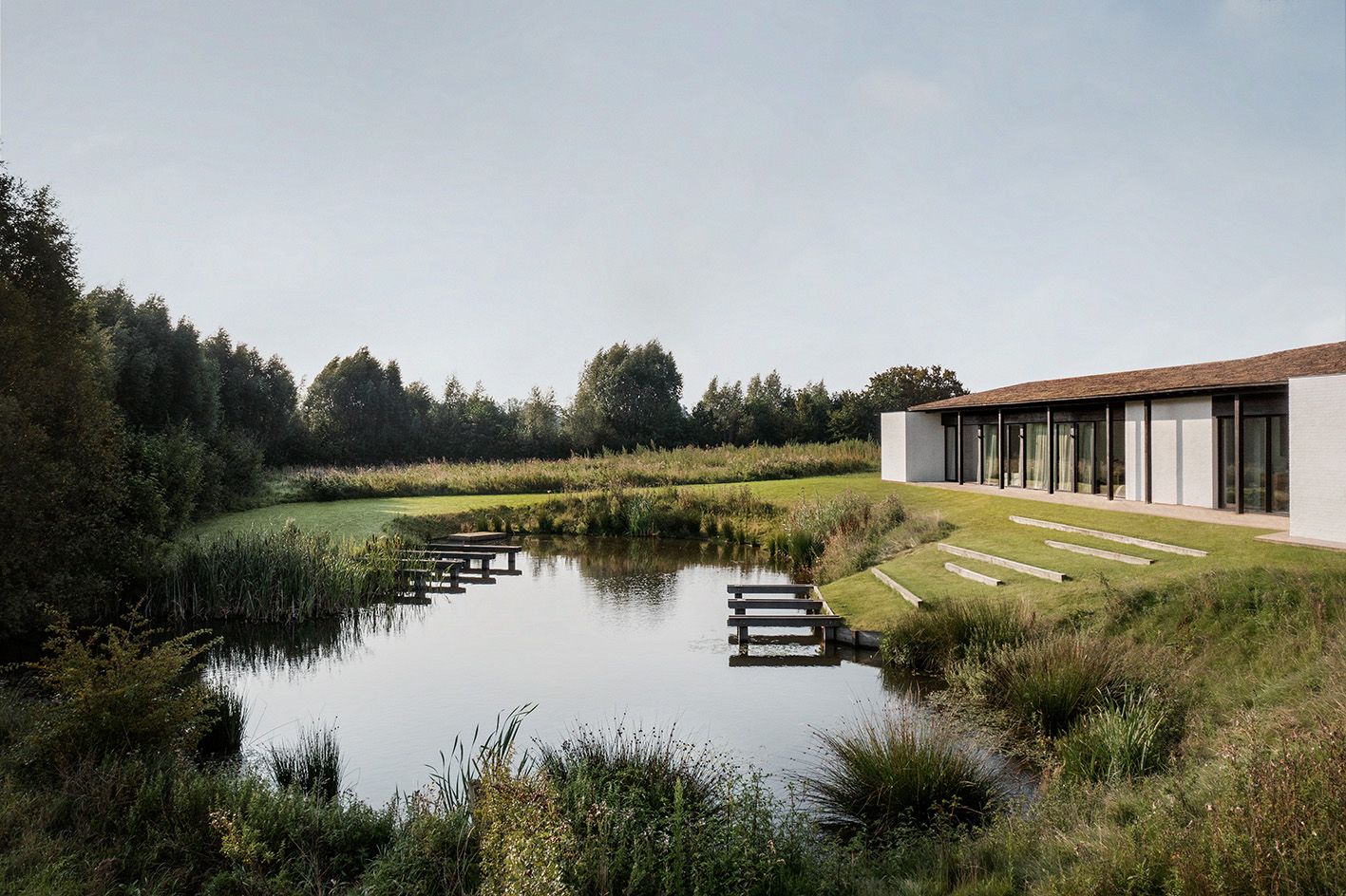 pond new house in the fields