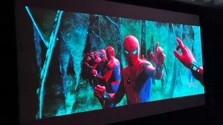 JVC NZ900 projector displaying image of Spider-Man