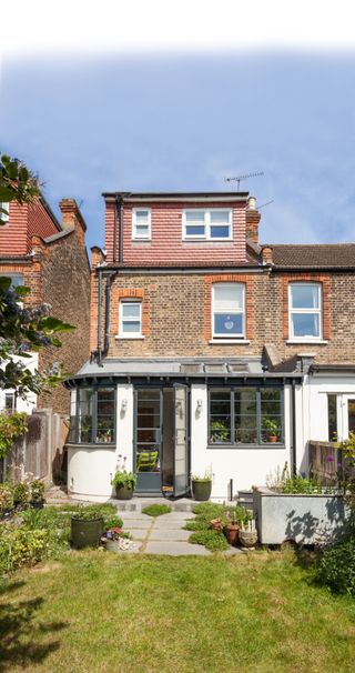 rear extension of terraced victorian house with steel frame windows and doors photographed by Bruce Hemming