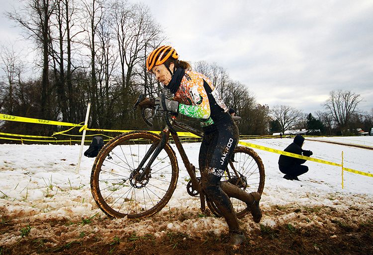 Kathryn Cummings (Jalapeno Cycling) Pushes the bike up the climb