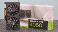 A PNY GeForce RTX 4060 Verto on a table with its retail box
