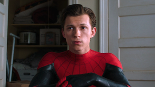 Tom Holland sitting down in Spider-Man suit at the end of Spider-Man: Far From Home