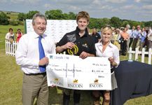 Winner_Angus_Smales_receiving_his_prize_from_Battles_Equine_Commercial_Manager_-_Anna_Clarke,_and_Battles_Chairman_Jim_Bowen_.jpg