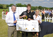 Winner_Angus_Smales_receiving_his_prize_from_Battles_Equine_Commercial_Manager_-_Anna_Clarke,_and_Battles_Chairman_Jim_Bowen_.jpg
