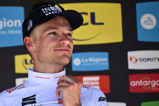 Best young rider Ineos Grenadiers teams British rider Ethan Hayter celebrates during the podium ceremony for the sixth stage of the 74th edition of the Criterium du Dauphine cycling race in Gap central eastern France on June 10 2022 Photo by Marco BERTORELLO AFP Photo by MARCO BERTORELLOAFP via Getty Images