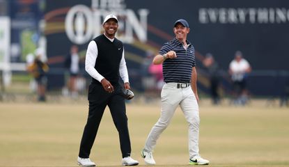 Woods and McIlroy walk the fairway at St Andrews