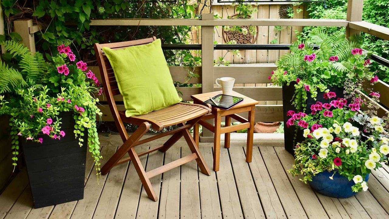 decking with flowers and chair