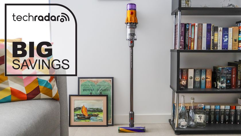 Dyson V12 Detect Slim vacuum in a lounge, with Big Savings graphic
