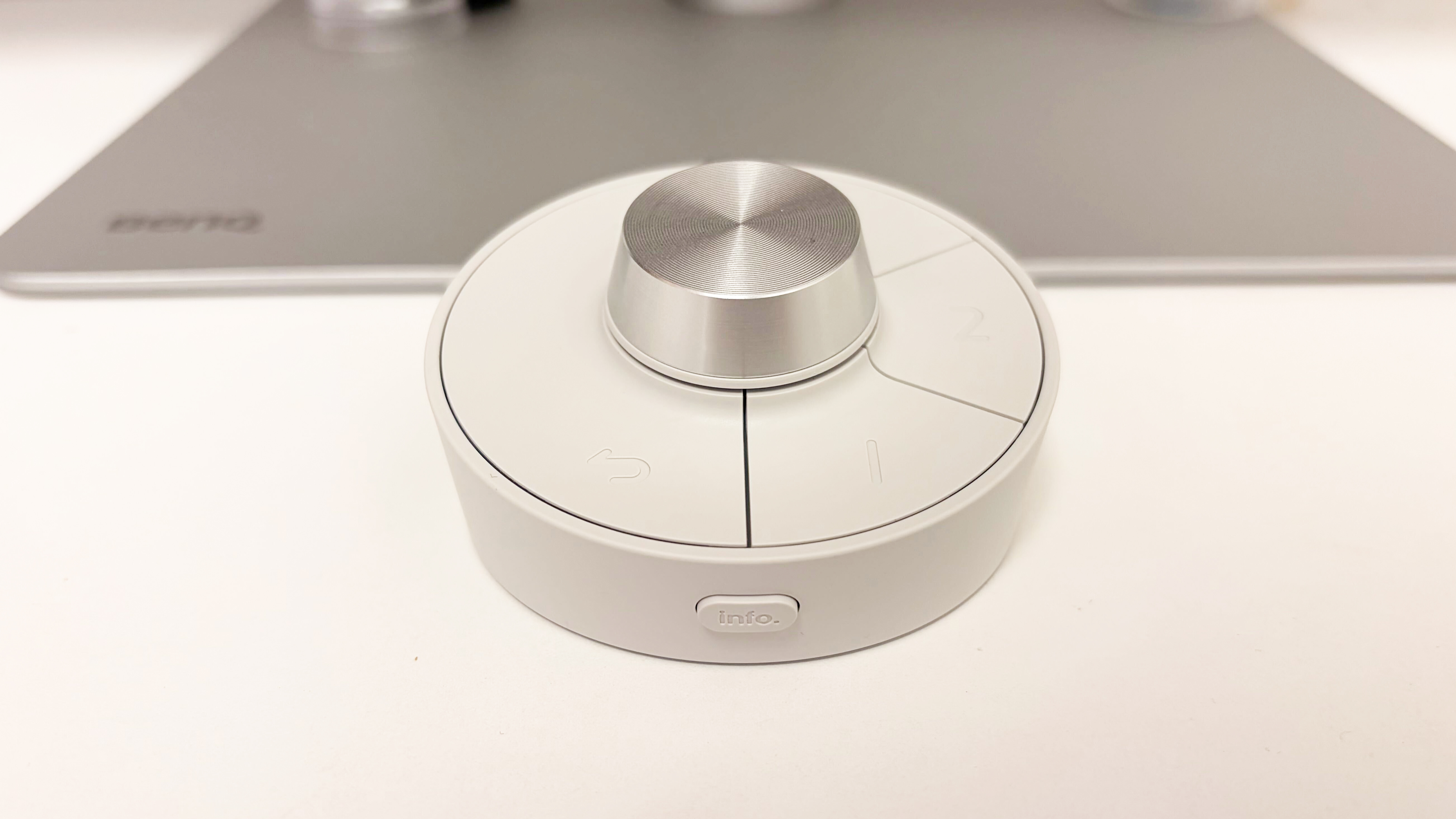 A photo of the BenQ PD3226G hockey puck controller