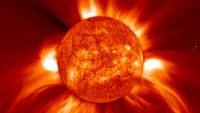 An orange sphere surrounded by flares.