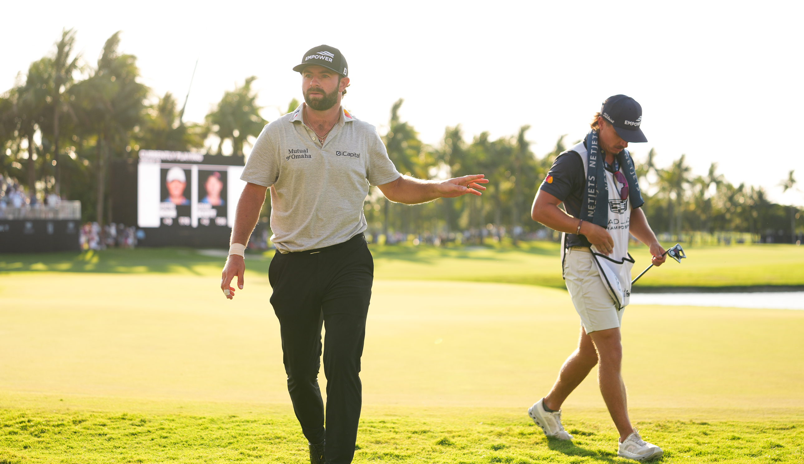 Cameron Young walks off the 18th green during the second round of Cadillac Championship at Trump National Doral - Blue Monster