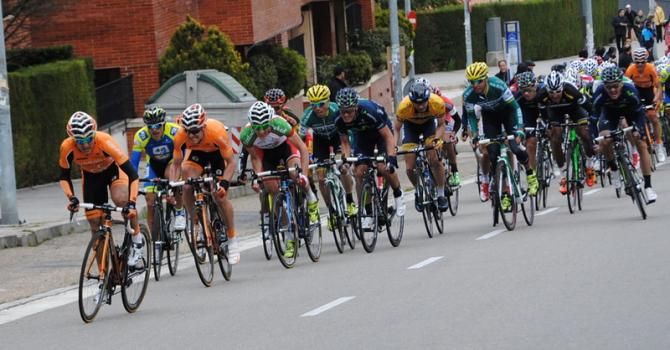 Lobato launching the sprint for Urtasun, with Barbero on his wheel