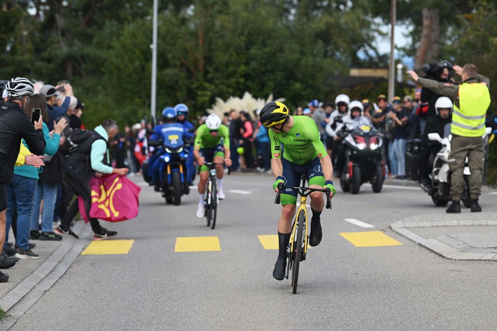 ZURICH SWITZERLAND SEPTEMBER 29 LR Tadej Pogacar and Jan Tratnik of Team Slovenia compete in the chase group during the 97th UCI Cycling World Championships Zurich 2024 Mens Elite Road Race a 2739km one day race from Winterthur to Zurich on September 29 2024 in Zurich Switzerland Photo by Dario BelingheriGetty Images
