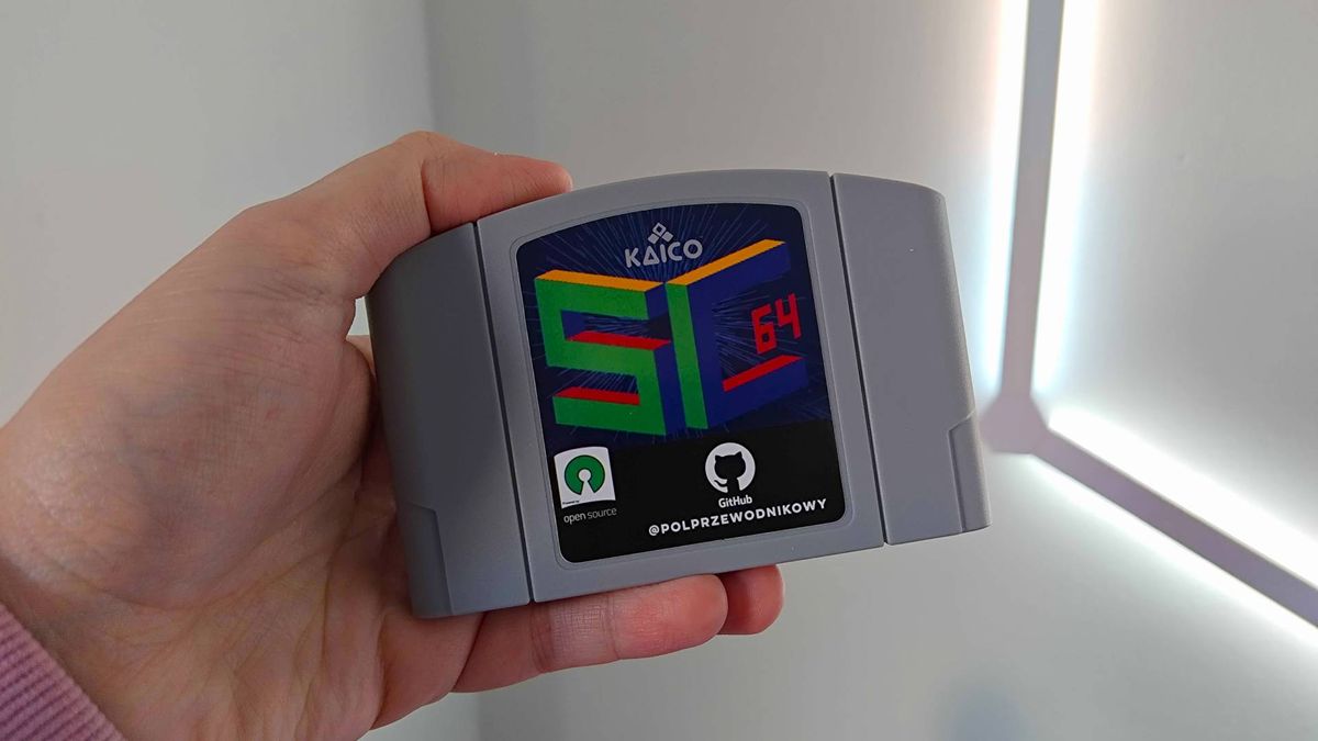 hand holding Summercart64 with white light in backdrop