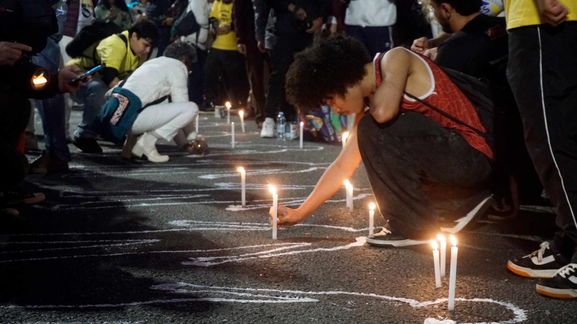 People take part in a demonstration against the police operation in Rio de Janeiro and in protest against Governor Claudio Castro