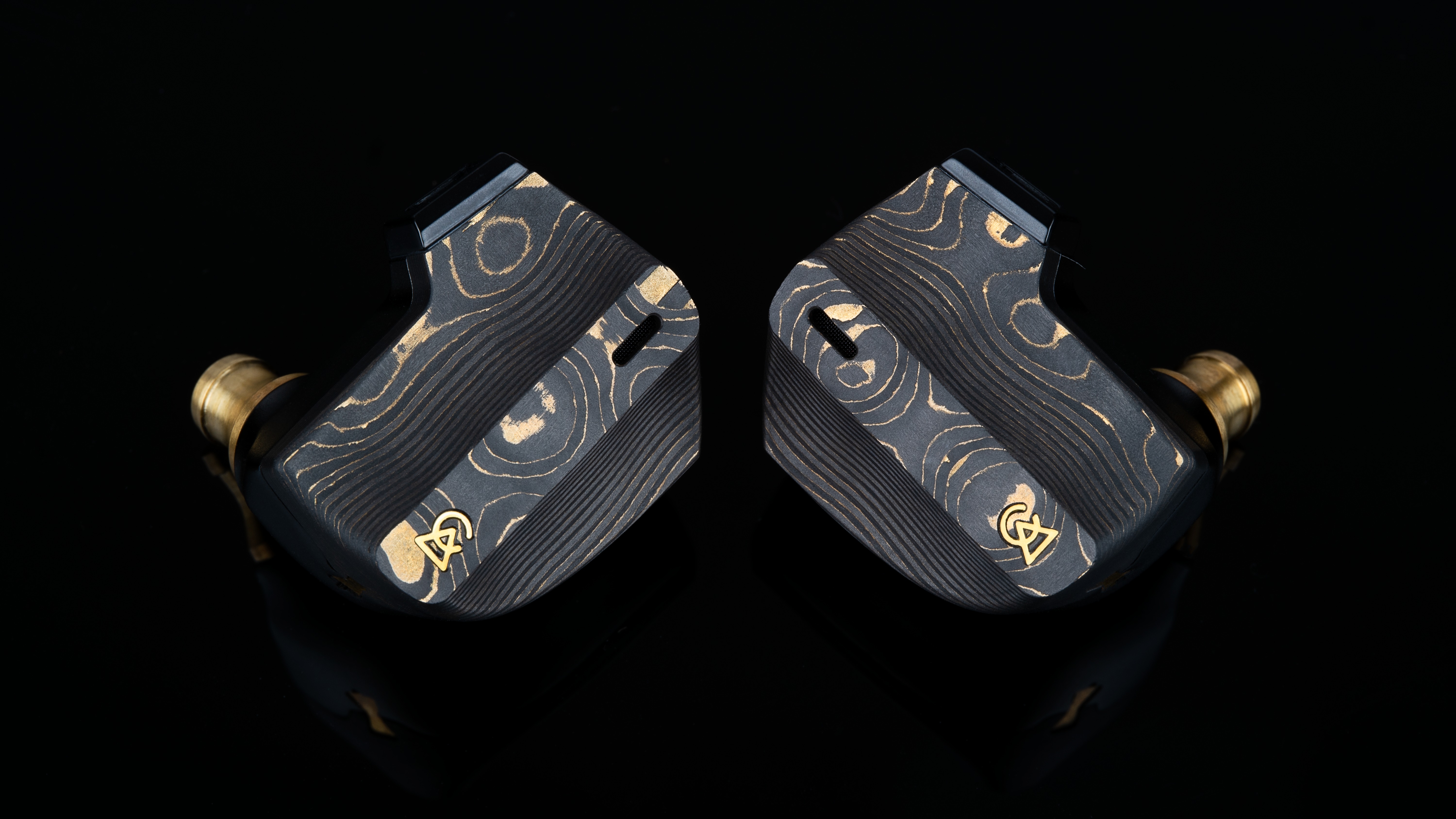 Campfire Audio Chimera wired in-ear headphones on a black background