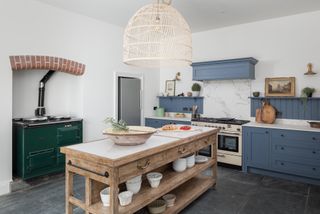 blue kitchen in manor house in Devon