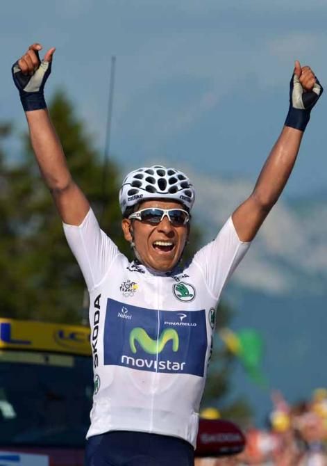 Nairo Quintana (Movistar) throws his arms in the air after winning stage 20