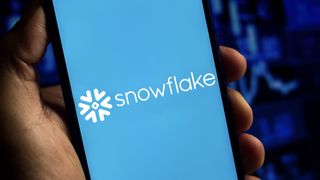 Snowflake logo on a light blue bakcground on a mobile phone screen