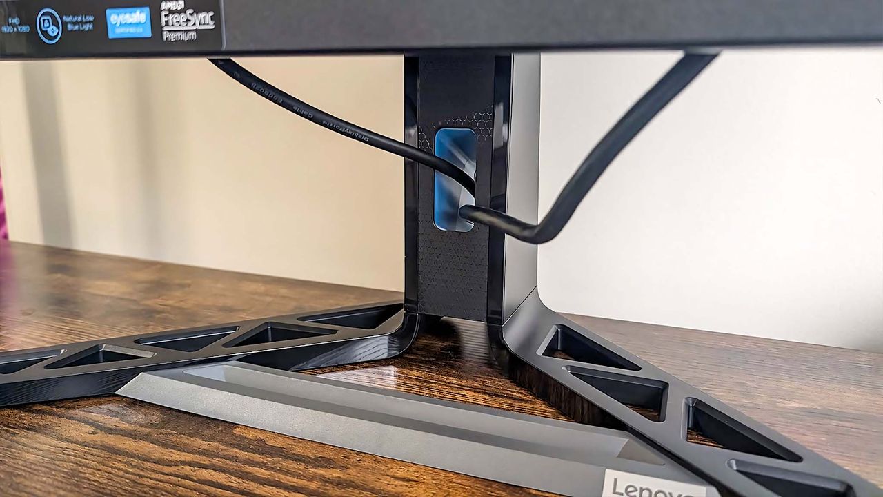 Closeup of the cable tidy hole built into the Lenovo Legion R27fc-30 stand.