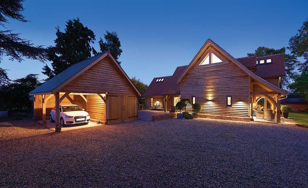 outbuilding-cum-garage designed 9along with the main house by Pete Tonks and built by Oakwrights