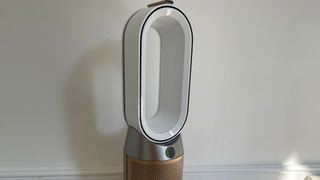 Dyson Hot + Cool Air Purifier in the bedroom with the remote on top