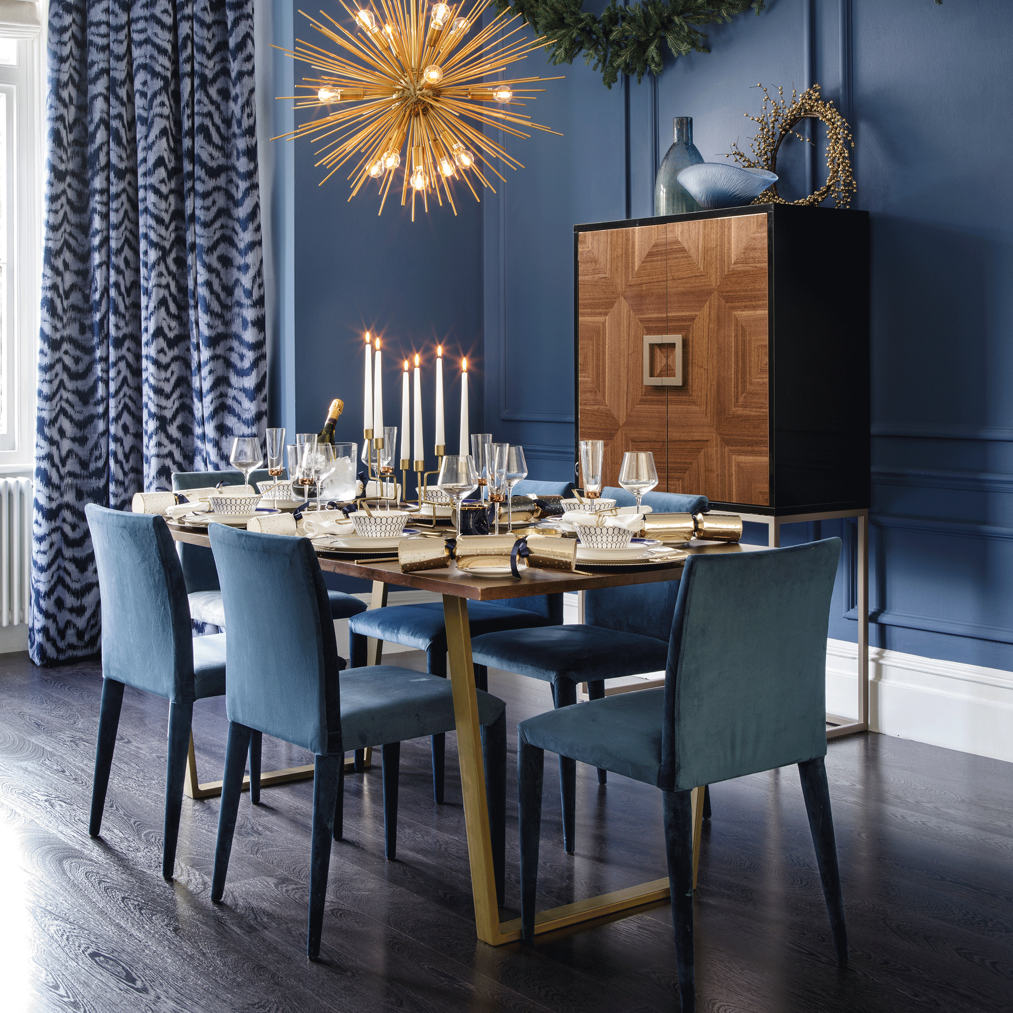 Navy blue wall with dining table
