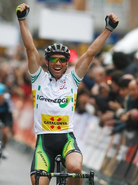 Race leader Michael Albasini (GreenEdge) celebrates victory on stage 2.