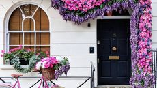 Floral small front porch idea with bicycle