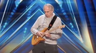 Guitar teacher John Wines shreds during an audition for America's Got Talent