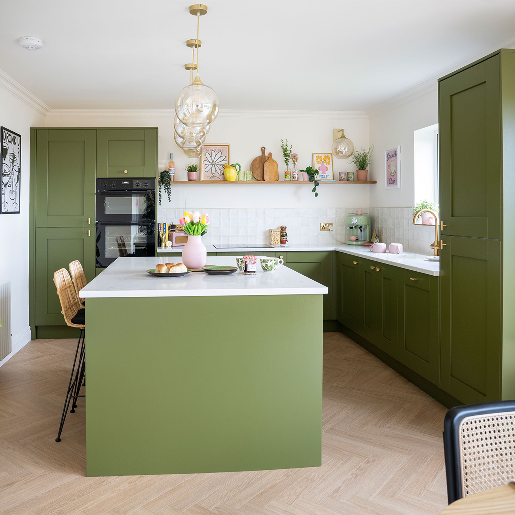 Green kitchen with central island