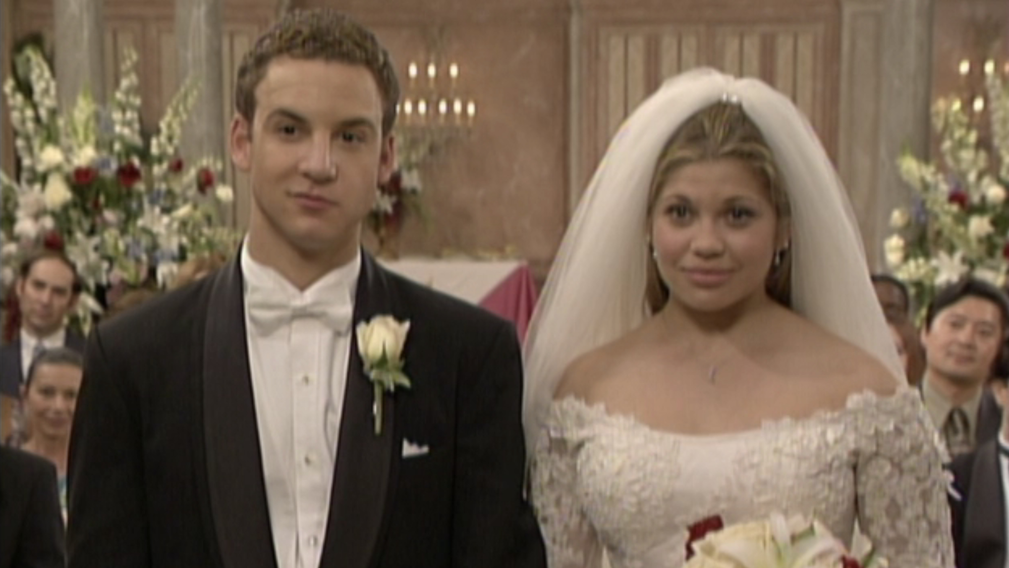 Cory Matthews (Ben Savage) and Topanga Lawrence (Danielle Fishel) get married on Boy Meets World.