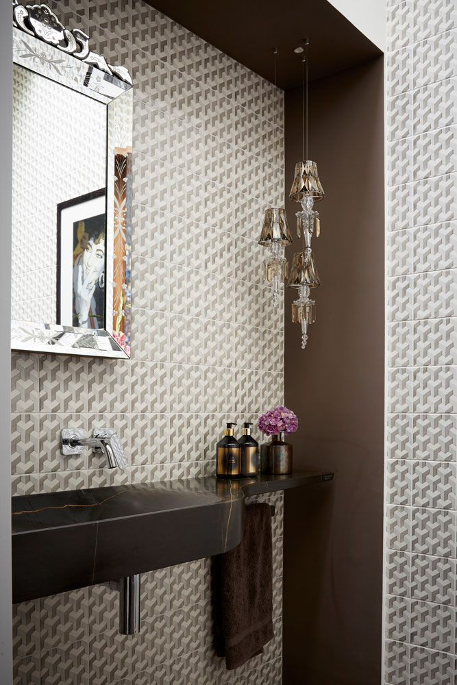 small bathroom idea with wallpaper walls and built in sink with shelf