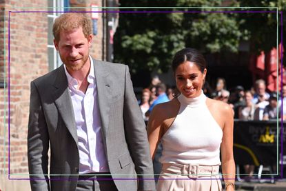 a medium shot of Prince Harry and Meghan Markle smiling and walking together