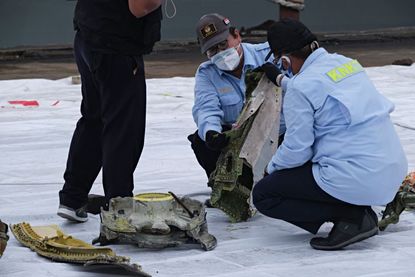 Indonesia plane crash recovery.