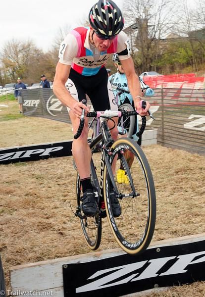 Jeremy Powers (Rapha-Focus) bunny-hopping the barriers with the race lead