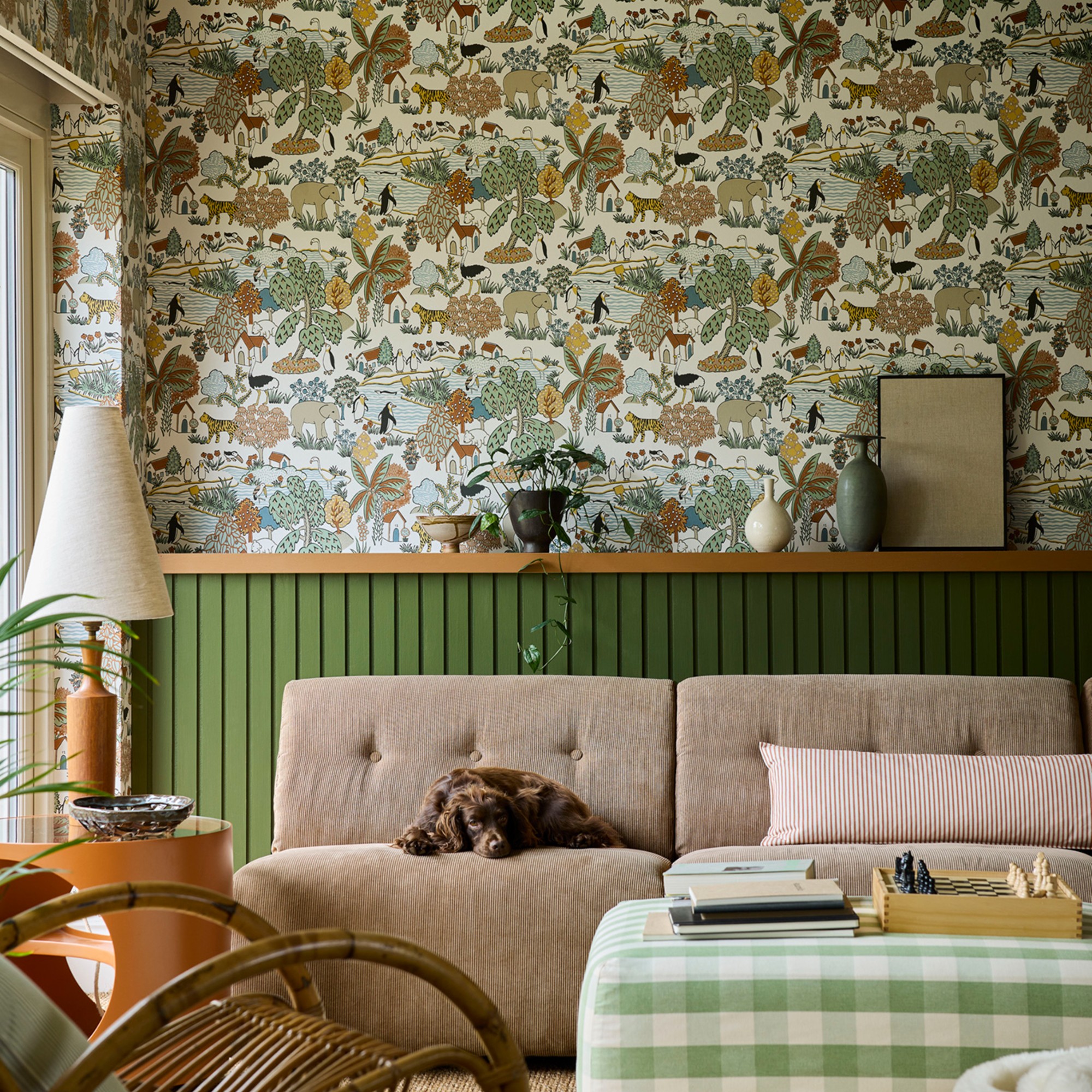 Little Greene’s Animal Kingdom wallpaper in a living room