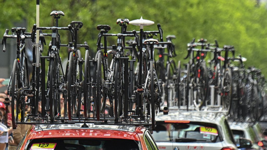 Cycle teams support vehicles take the start of the first stage of the Giro dItalia 2022 cycling race 195 kilometers between Budapest and Visegrad Hungary on May 6 2022 Photo by Attila KISBENEDEK AFP Photo by ATTILA KISBENEDEKAFP via Getty Images