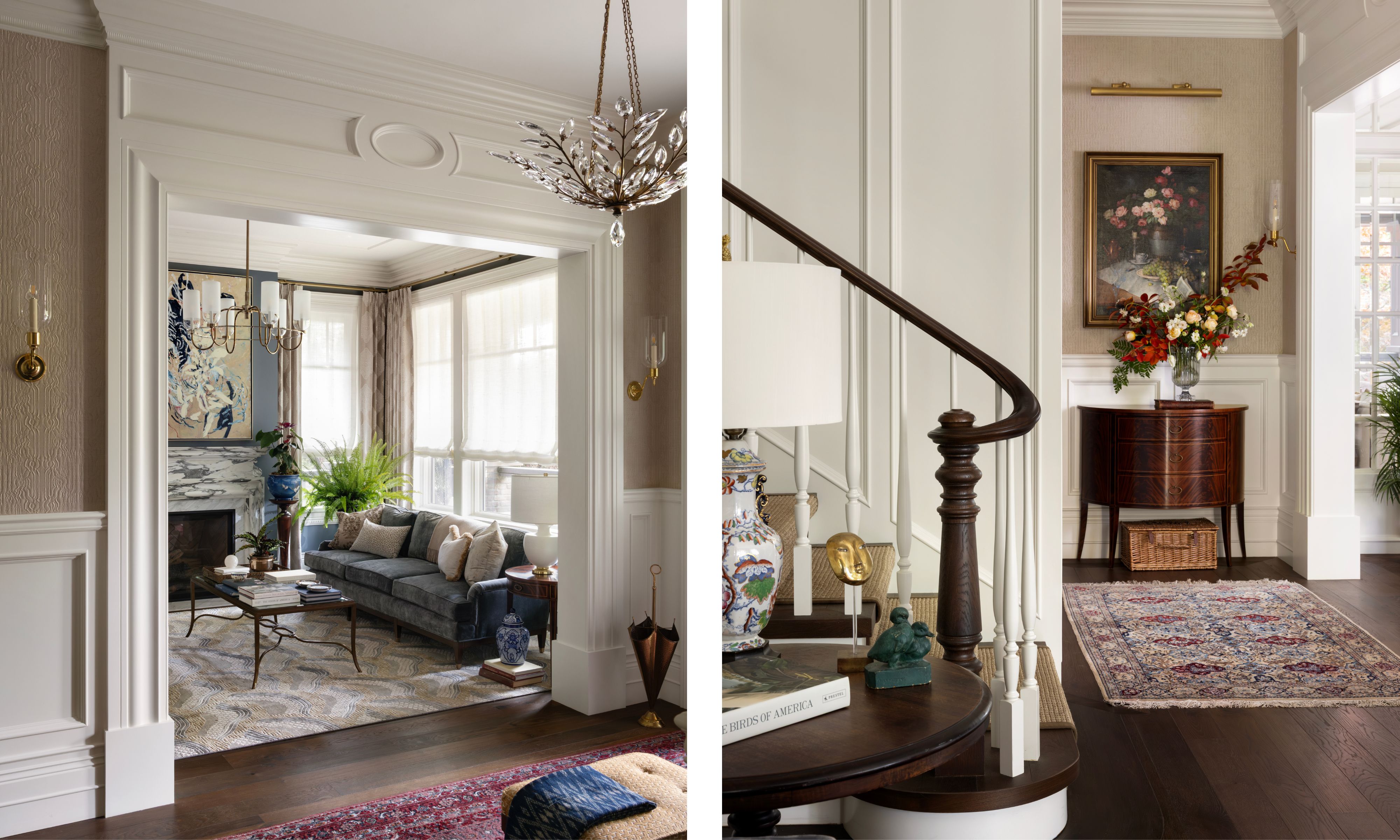 the entryway to a Shaugnessy tudor-style manor home with a sweeping wooden stairs, traditional panelling and crown molding and vintage rugs in the entry