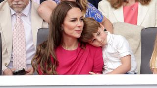 Catherine, Duchess of Cambridge hugs Prince Louis of Cambridge during the Platinum Pageant