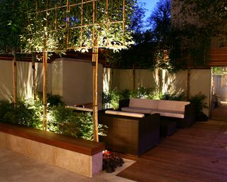 courtyard garden with deck lights and modular garden furniture