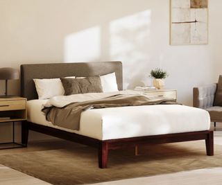 Nectar Bed Frame with Headboard against a white wall.