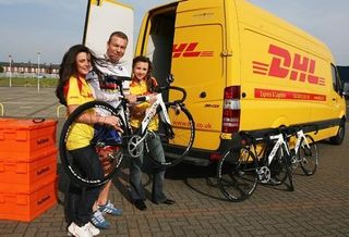 Chris Hoy and his helpers load up bikes